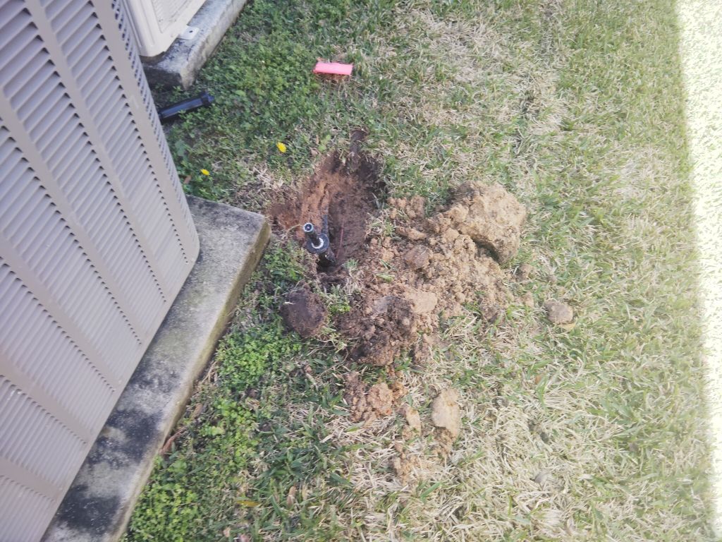 Mr Sprinkler Repair technician working on landscaping in Houston TX